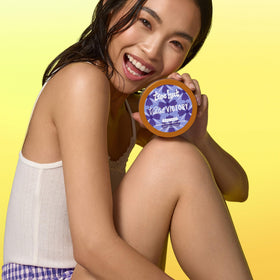 Tree Hut Violet Victory Whipped Body Butter on a bathroom shelf