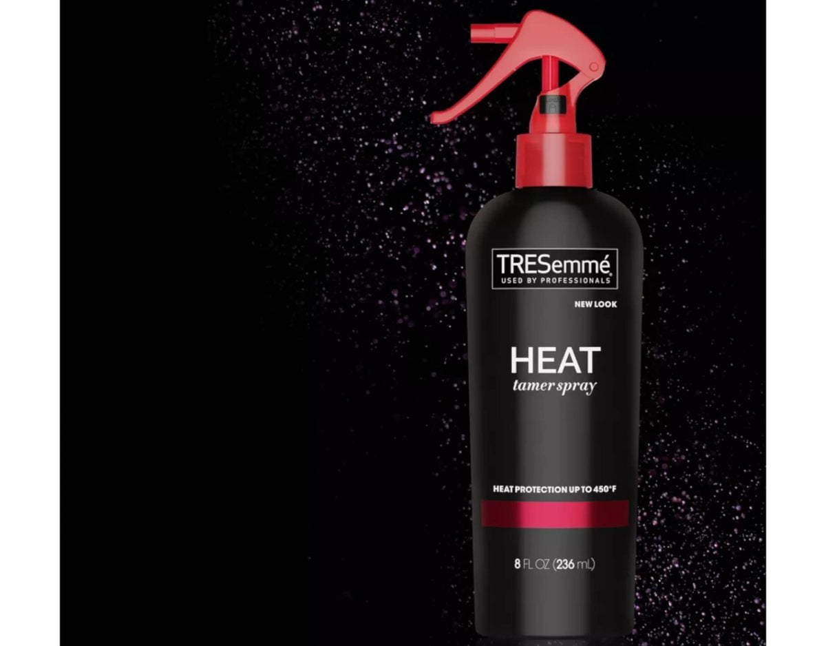 TRESemmé Heat Tamer Spray in a bathroom setting