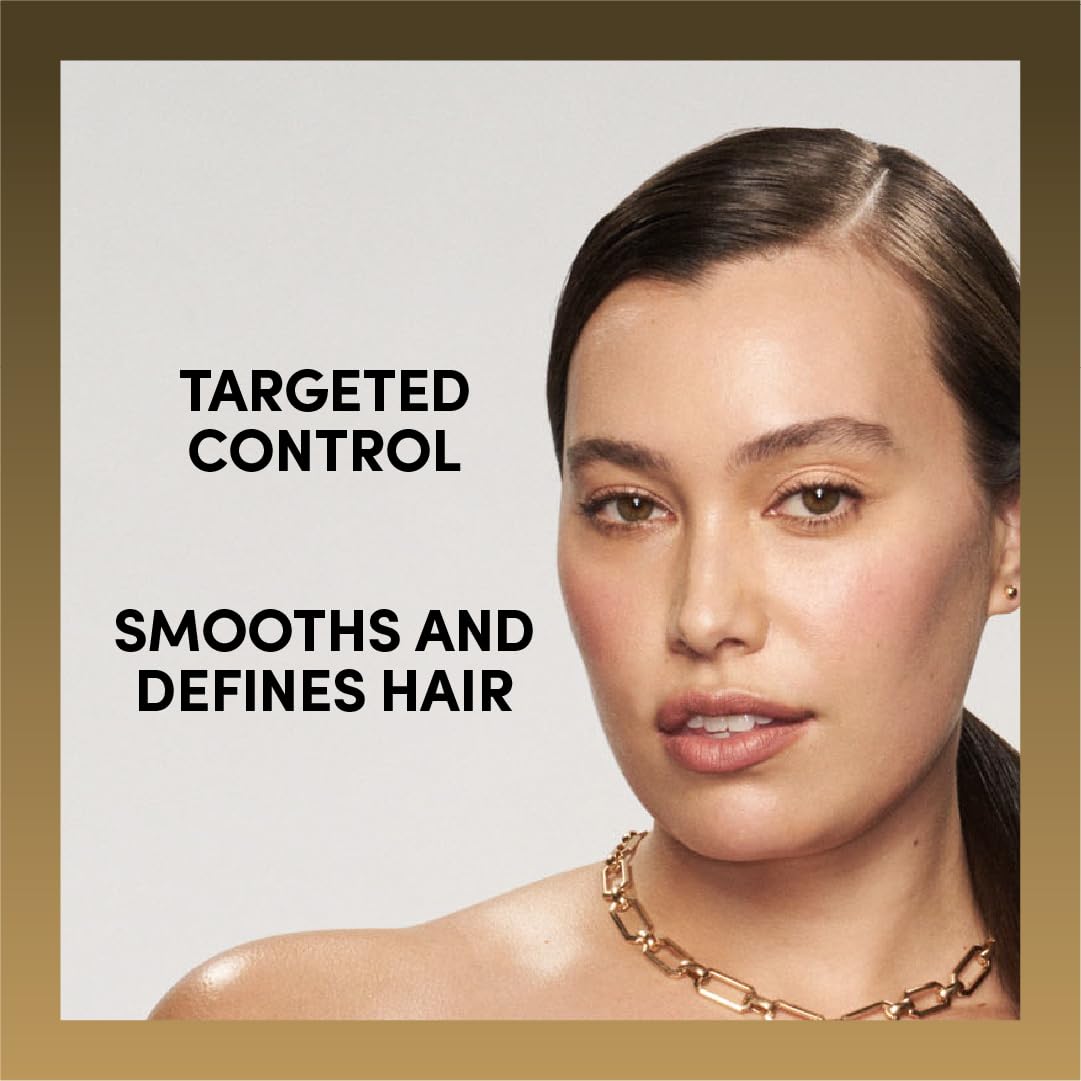 TRESemmé Instant Fix Styling Stick on a vanity with other hair products
