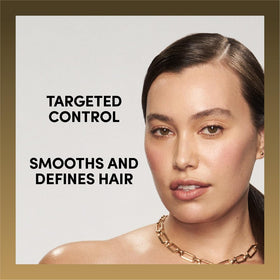TRESemmé Instant Fix Styling Stick on a vanity with other hair products