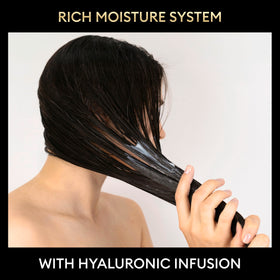 TRESemmé Rich Moisture Shampoo and Conditioner on a vanity