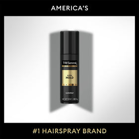 TRESemmé Travel Hairspray Extra Hold demonstrating usage