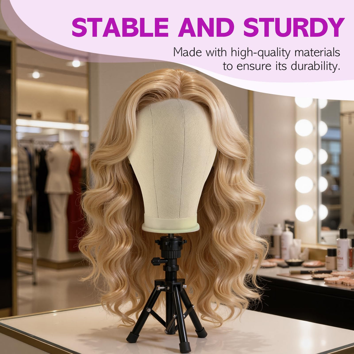 Tripod stand securely holding wig head for styling