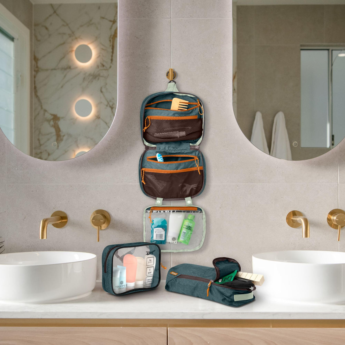 TRIPPED Toiletry Bag Kit Set hanging in a bathroom