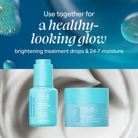 TULA Brightening Drops in hand
