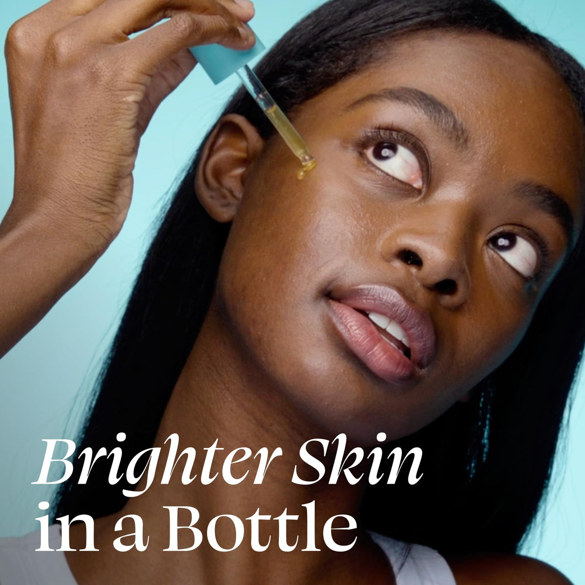 TULA Brightening Drops on a skincare shelf