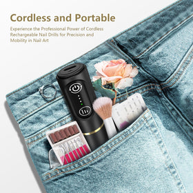 TUOBEO nail drill in use on acrylic nails