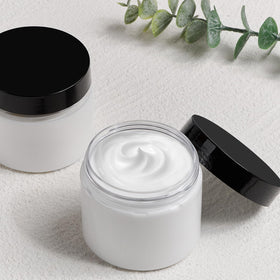 TUZAZO 6 oz containers in a travel kit