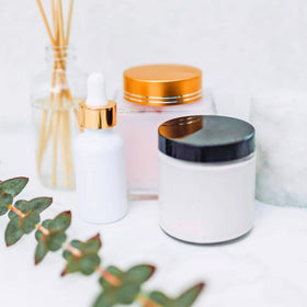 TUZAZO plastic containers in a travel kit