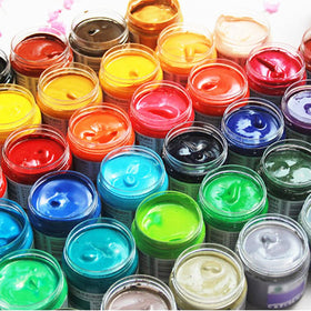 TUZAZO plastic containers with black lids on a white background