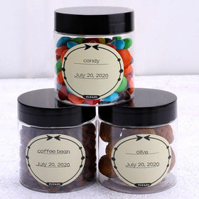 TUZAZO transparent jars with black lids on a shelf