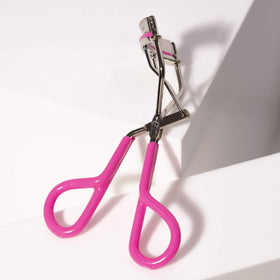Tweezerman Comfort Grip Eyelash Curler Neon Pink side view