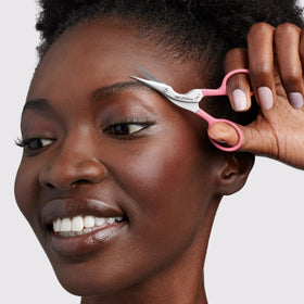 Tweezerman Eyebrow Brush with thick nylon bristles