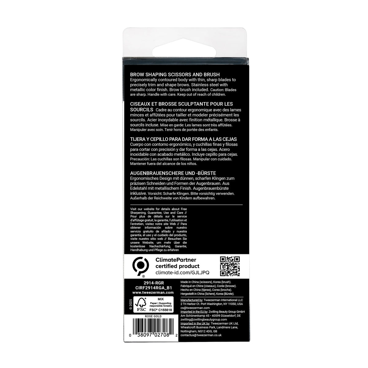 Tweezerman Eyebrow Scissors and Brush on a vanity