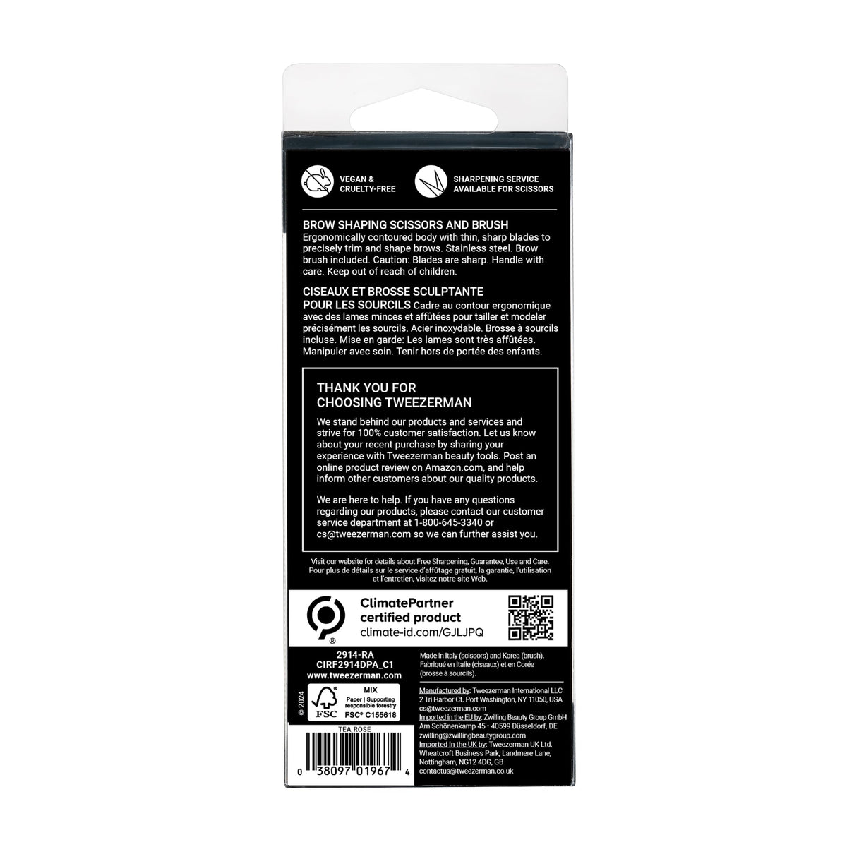 Tweezerman Eyebrow Shaping Scissors & Brush set on a vanity