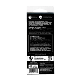 Tweezerman Eyebrow Shaping Scissors & Brush set on a vanity