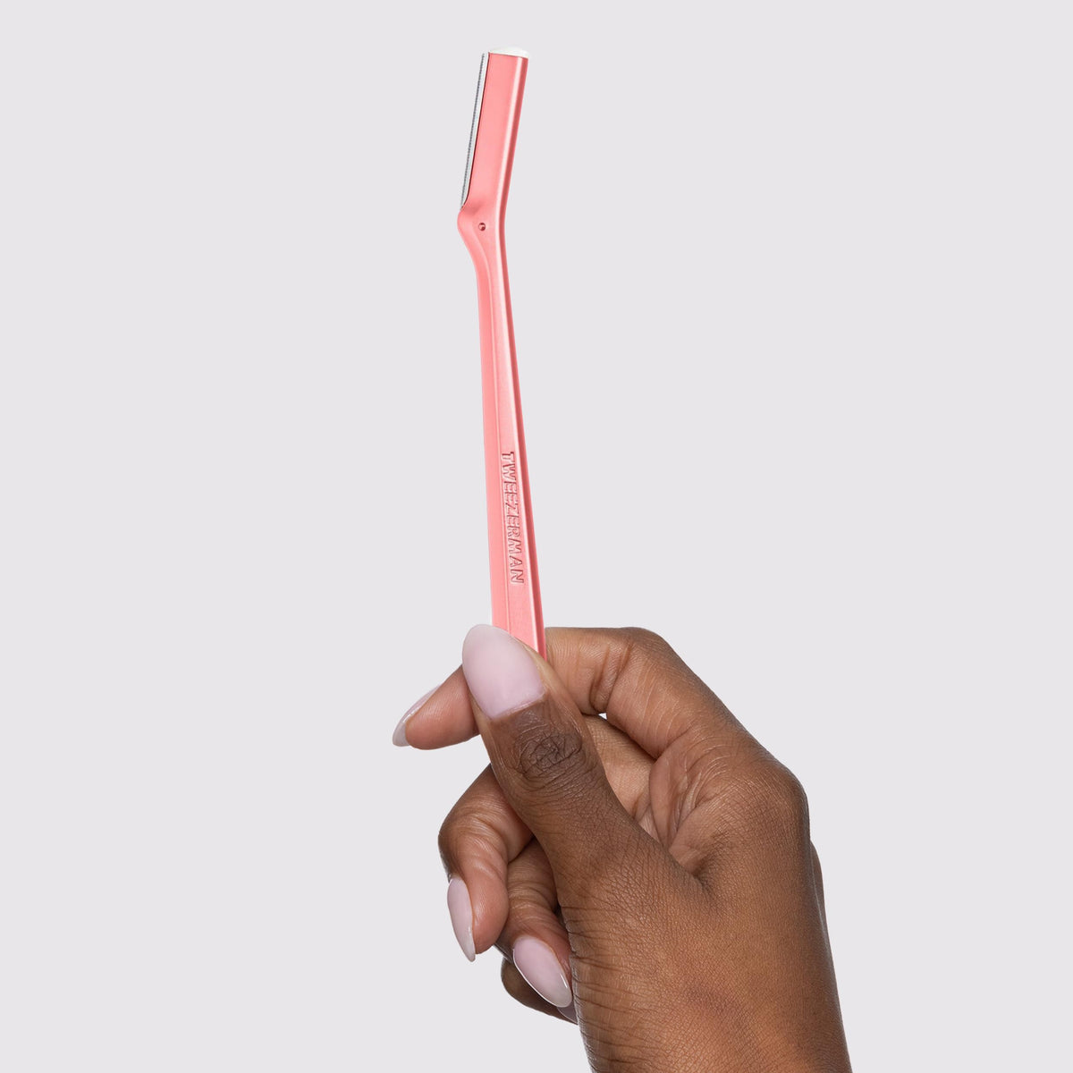 Tweezerman Facial Razor Tea Rose with safety cap
