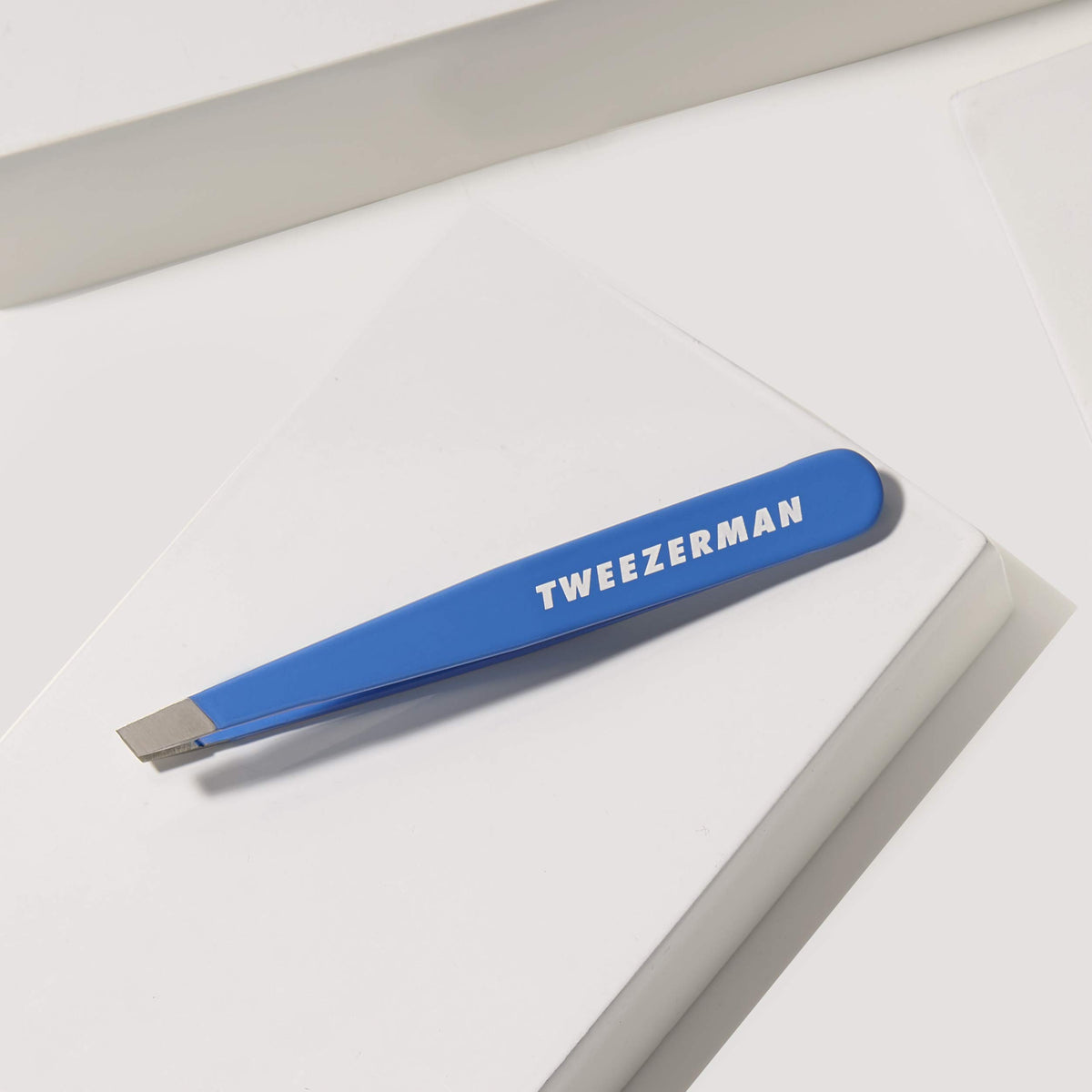 Tweezerman Mini Slant Tweezer Bahama Blue with packaging