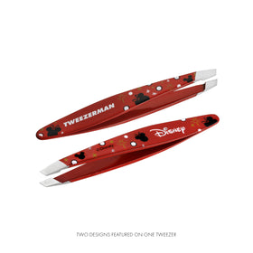 Tweezerman Mini Slant Tweezer in hand for demonstration