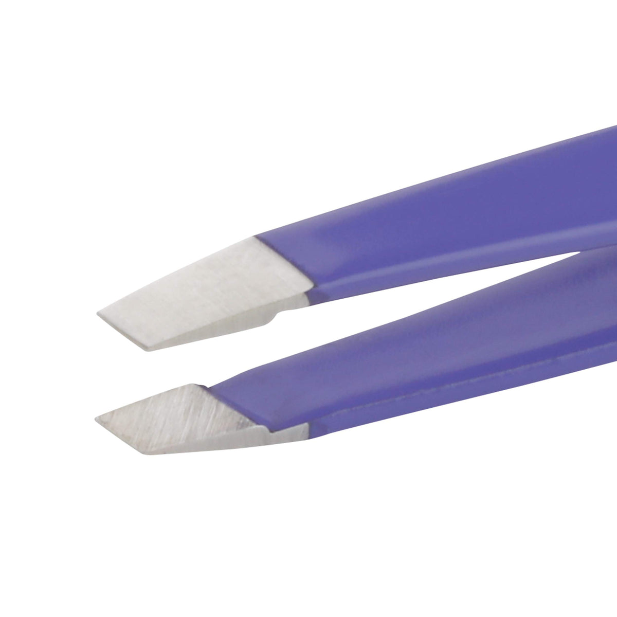 Tweezerman Mini Slant Tweezer on a vanity table