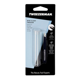 Tweezerman Mini Slant Tweezer on a vanity table