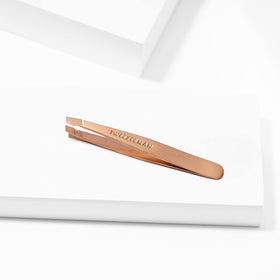 Tweezerman Mini Slant Tweezer Rose Gold tips close-up