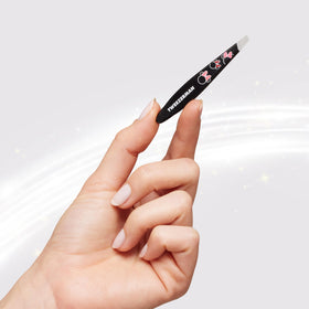 Tweezerman Minnie Mouse Mini Slant Tweezer in use on brows