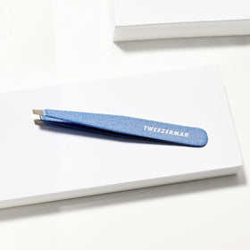 Tweezerman Slant Tweezer Granite Sky held in hand