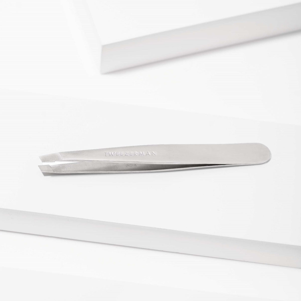 Tweezerman Slant Tweezer in use on eyebrows