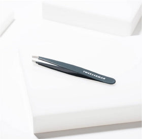 Tweezerman Slant Tweezer on a beauty table