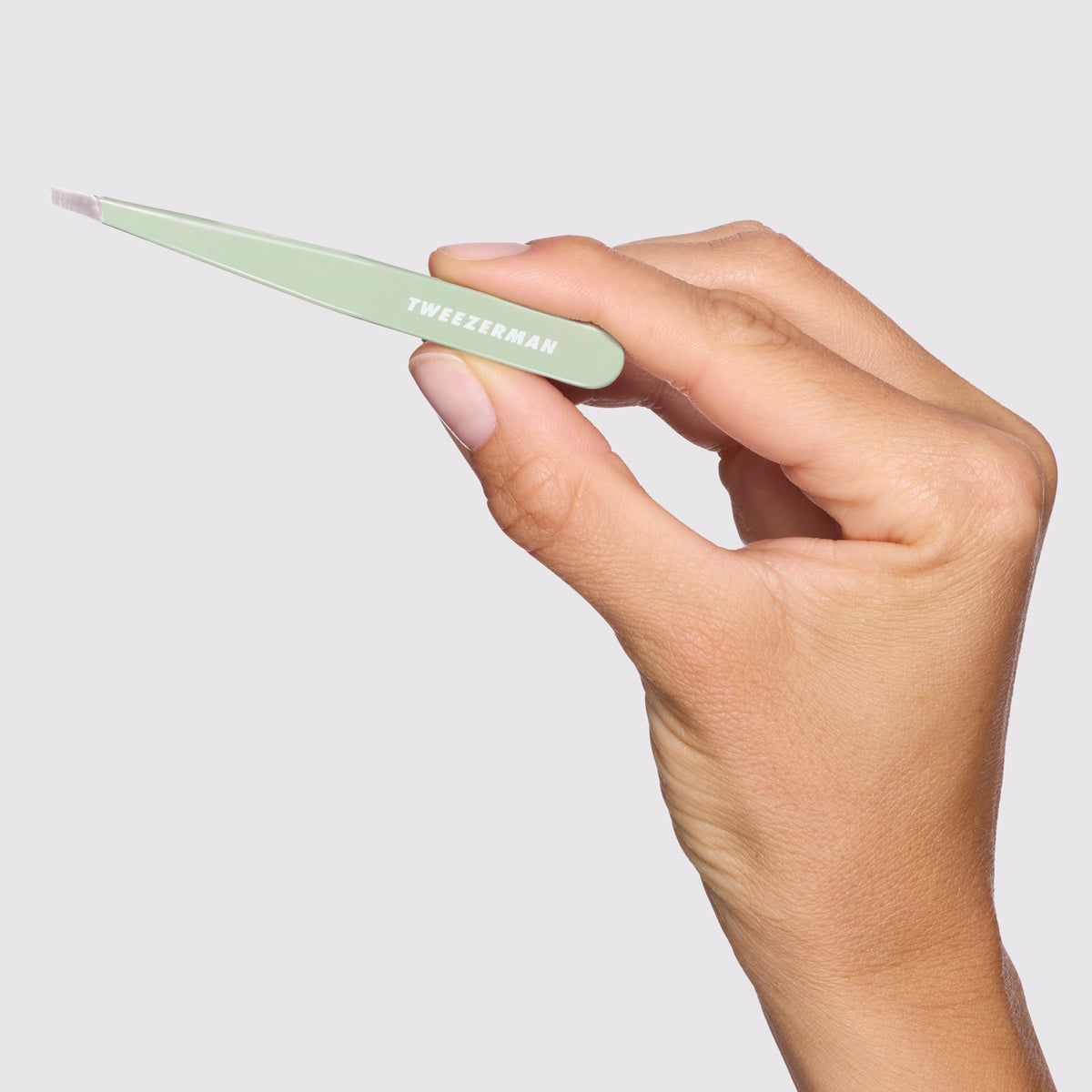 Tweezerman Slant Tweezer on a vanity