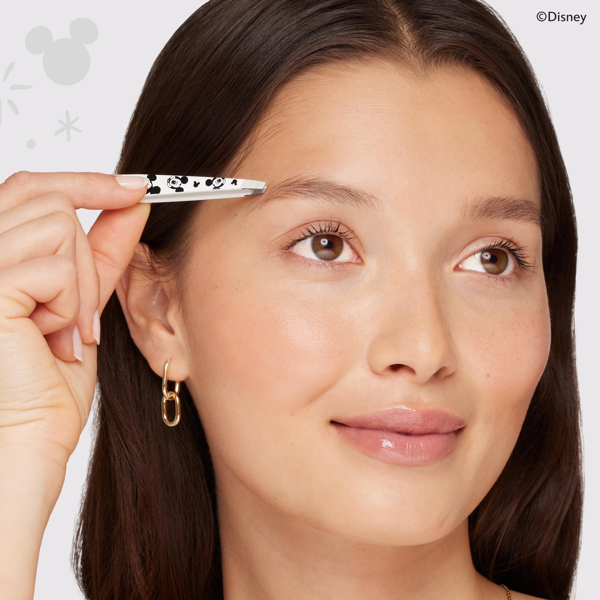 Tweezerman Slant Tweezer showing precision brow shaping