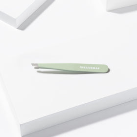 Tweezerman Slant Tweezer with warm washcloth