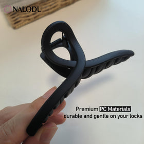 Two Nalodu hair claw clips displayed together on a surface