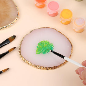 Two Pengxiaomei Resin Nail Art Palettes displayed together