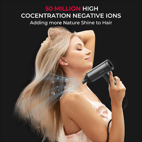 TYMO Blow Dryer with comb nozzle in action