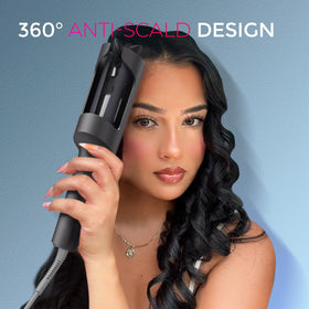 TYMO CURLPRO Automatic Rotating Curling Iron displayed on a vanity with hair products
