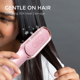 TYMO Hair Straightener Brush in use on straight hair