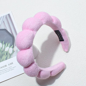 TYSSELY Spa Headband being worn while applying makeup
