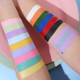 UCANBE Face Body Paint Palette with paintbrushes and colourful designs