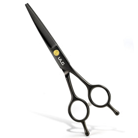 ULG Hair Cutting Scissors alongside hair care tools