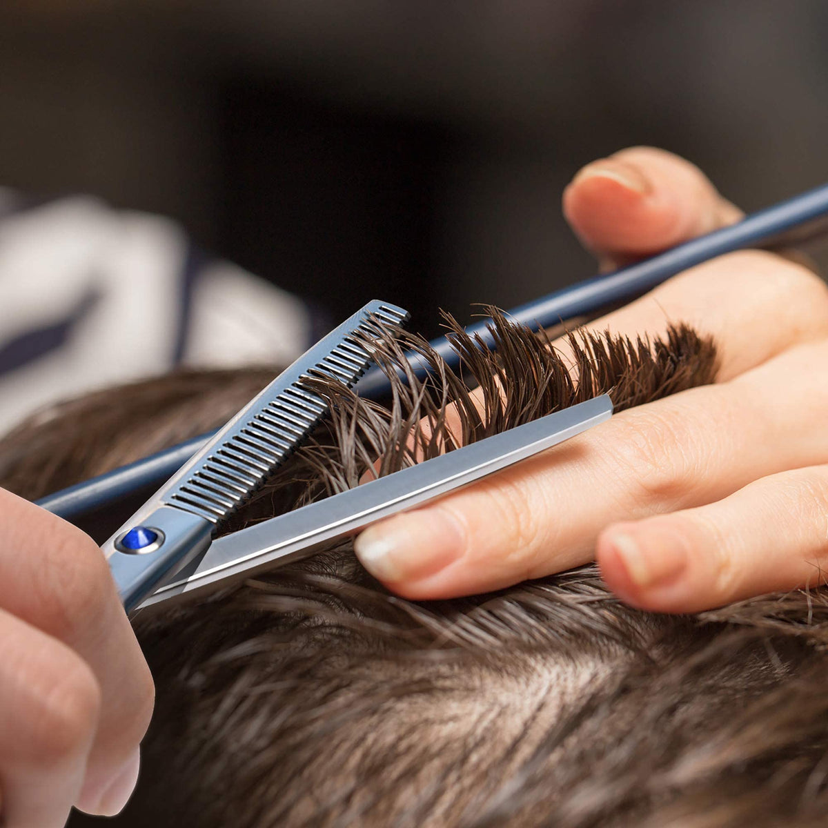 ULG hair scissors in use on hair