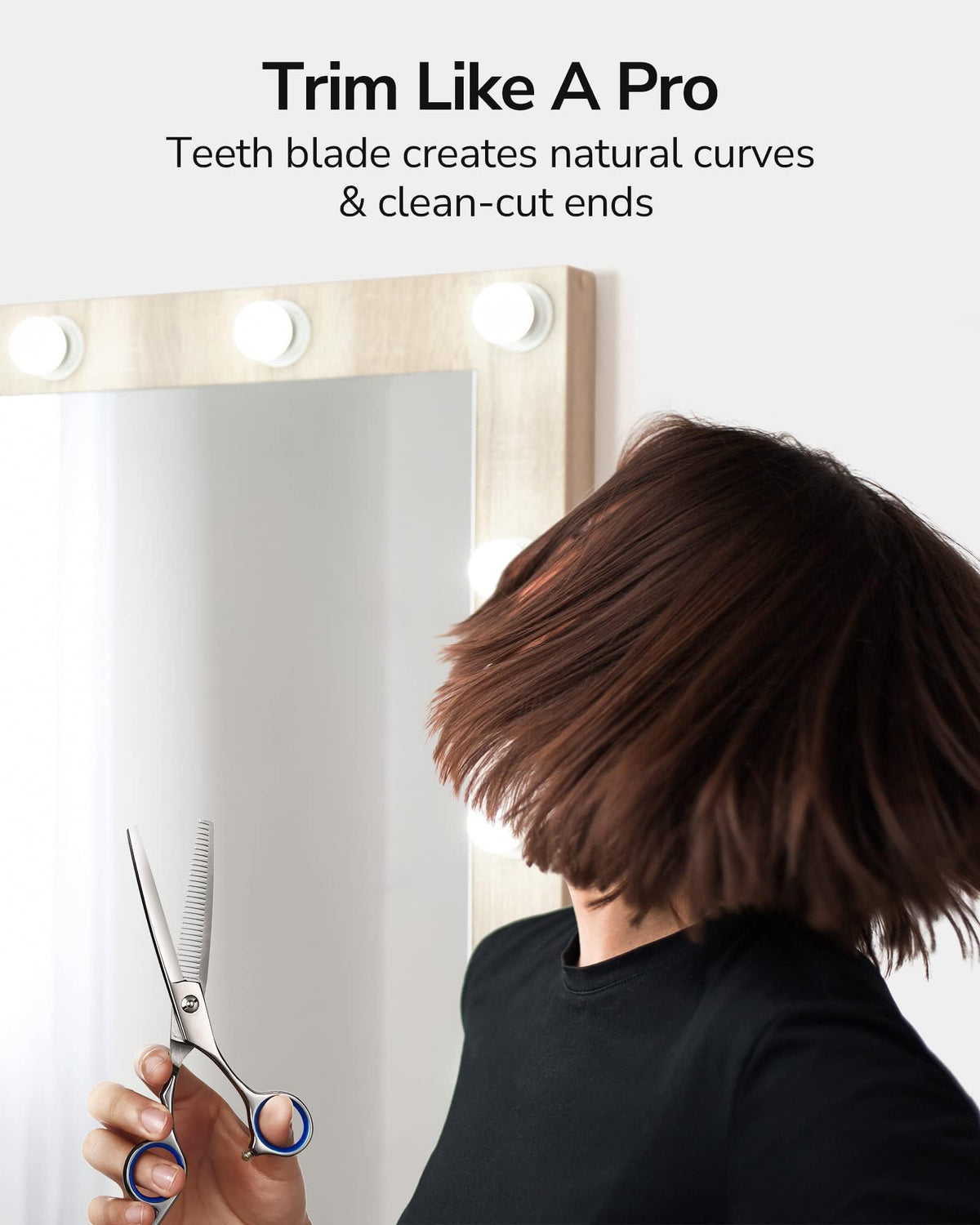 ULG Thinning Shears in use on hair with a comb