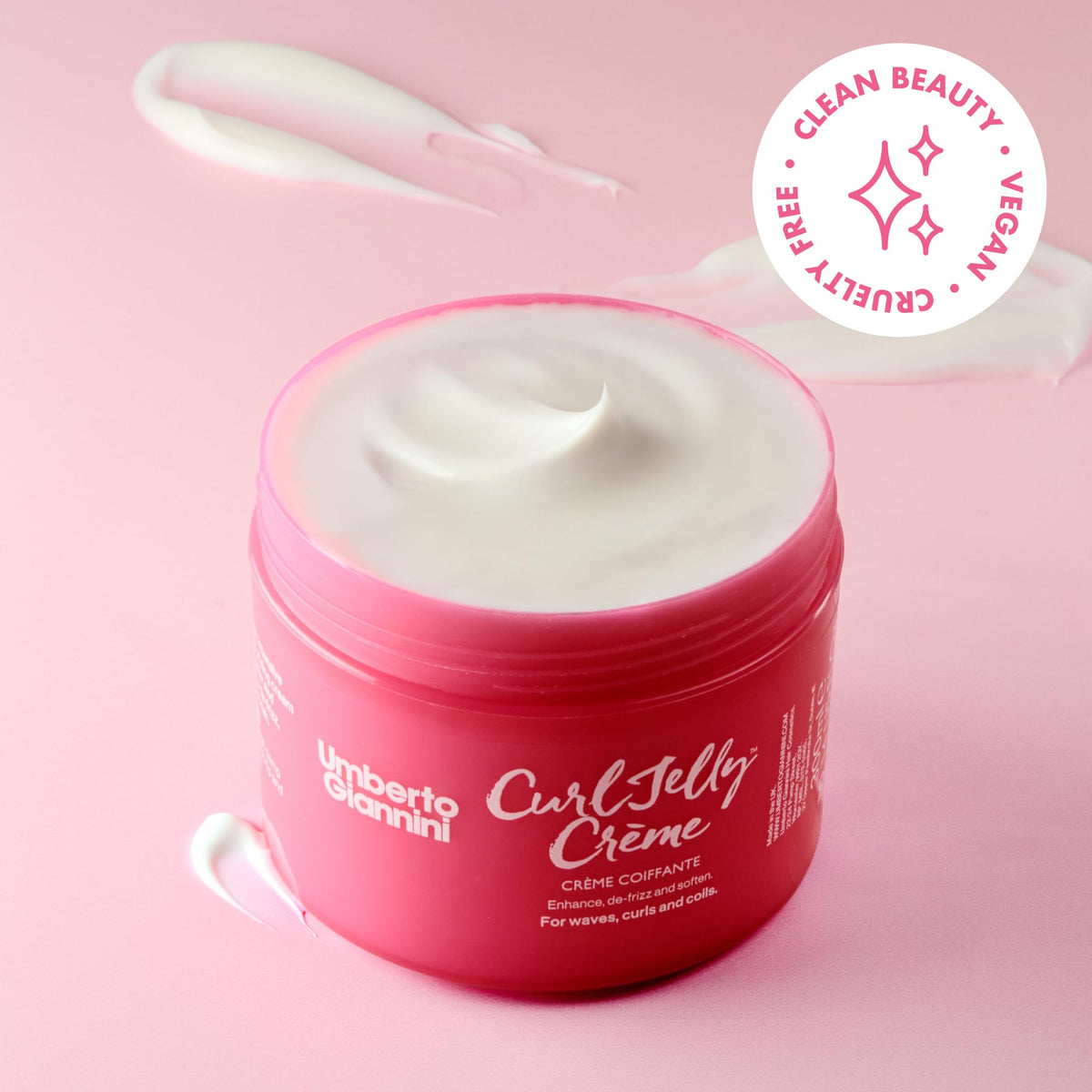 Umberto Giannini Curl Jelly Styling Crème being applied to damp hair