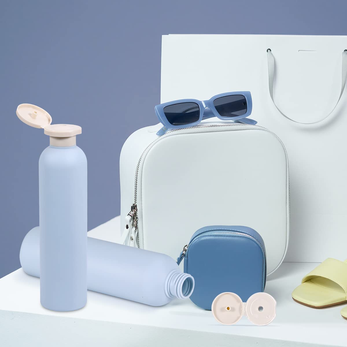 UMETASS blue travel bottle with toiletries