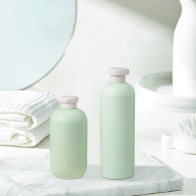 UMETASS squeeze bottle filled with lotion