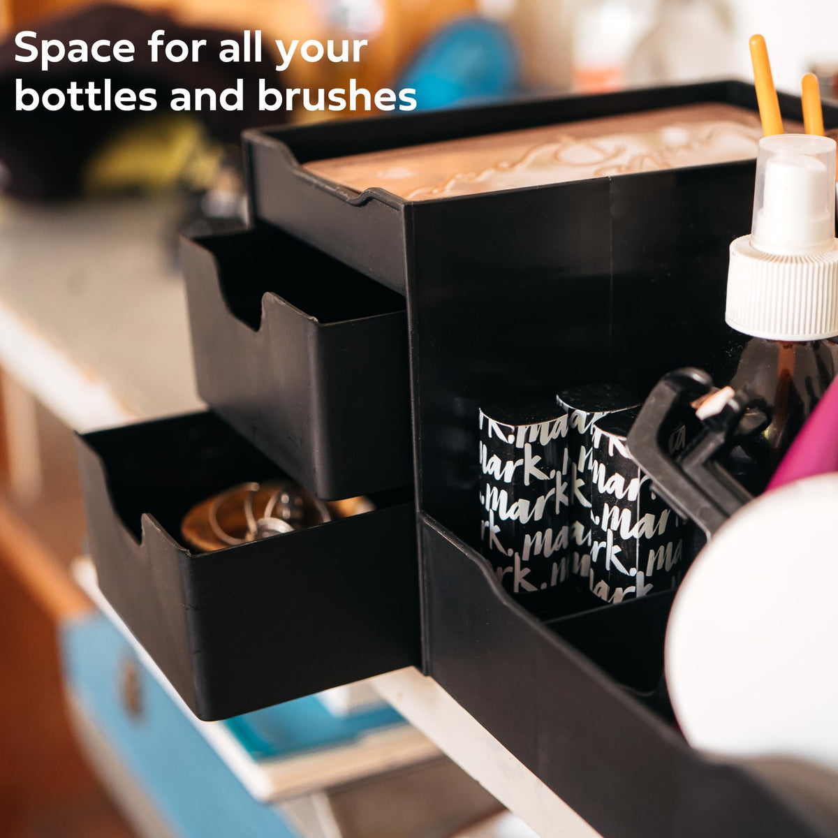 Uncluttered Designs Large Black Vanity Organizer demonstrating waterproof feature
