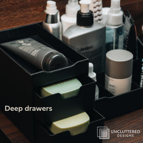 Uncluttered Designs Large Black Vanity Organizer with makeup brushes and lotions