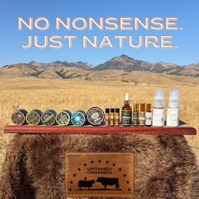 Untamed Organics Pure Tallow Lip Balm displayed on a table