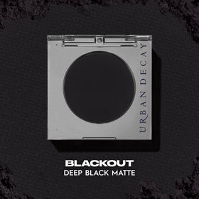 URBAN DECAY 24/7 Eyeshadow Deep Black Matte on a makeup palette
